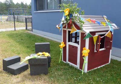Unser Spielhaus Lodge sorgt für glückliche Kinder im Garten